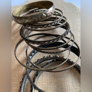 Set of 11 brass tone bangles. For the bohemian style outfit. Mix and match.